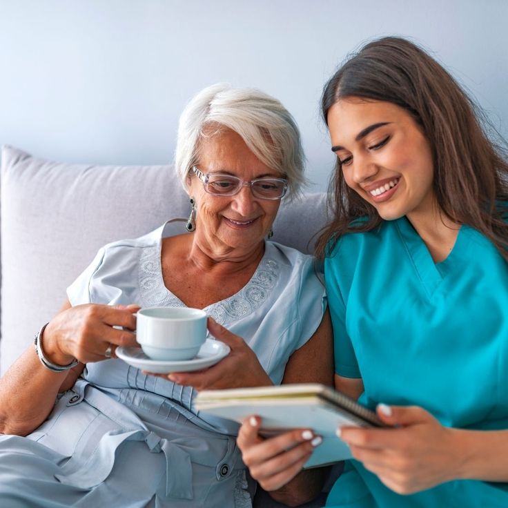 Caregiver supporting elderly person